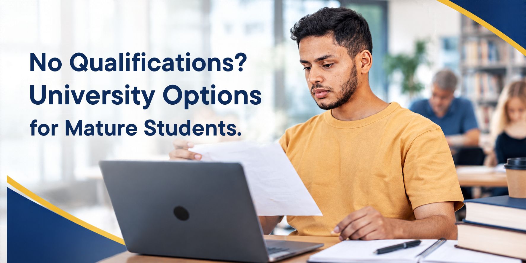 No Qualifications? University Options for Mature Students — a mature student reviewing documents while studying on a laptop in a modern university library.